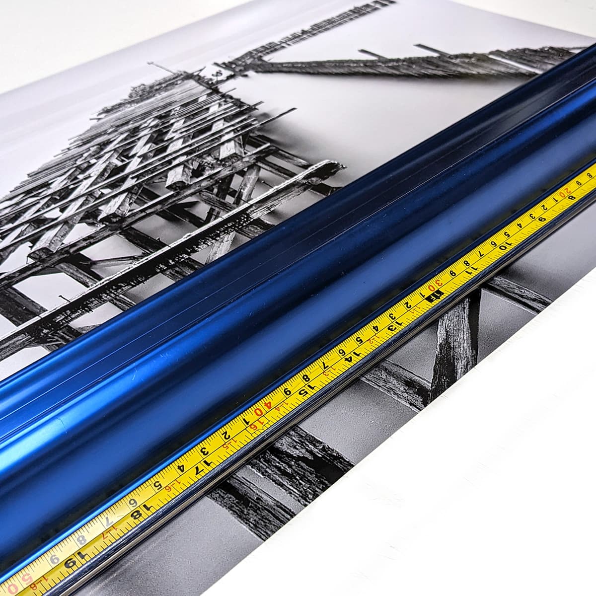 Image of a 16x20 poster print with a ruler on top
